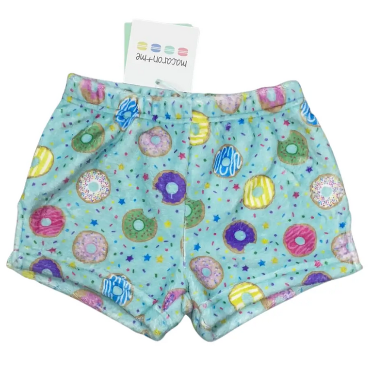 Children's shorts with colorful donut pattern on a white background